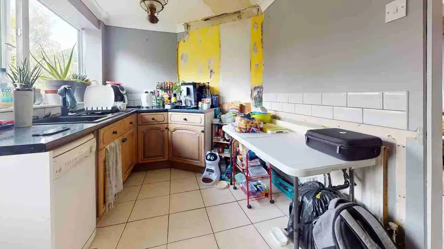 Kitchen before load-bearing wall removal in Coalville