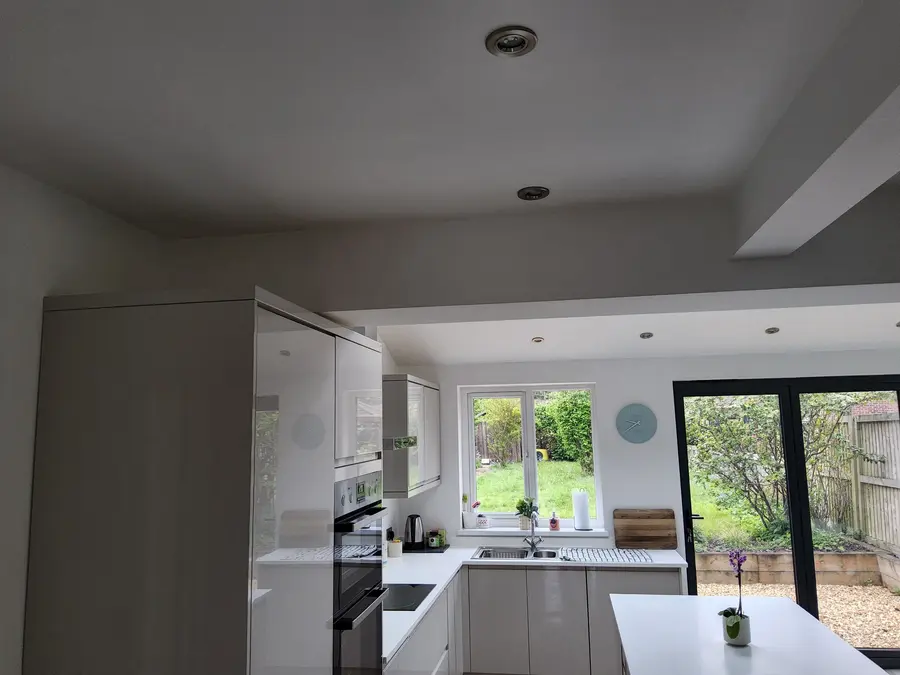Open-plan kitchen after wall removal in Derby
