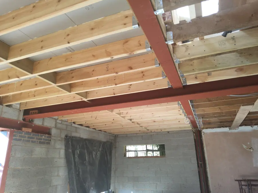 RSJ steel beam installation during wall removal in Loughborough