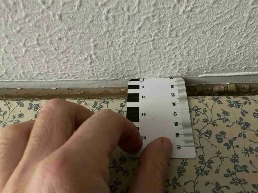 Floor-level crack investigated by structural engineer in Rugby